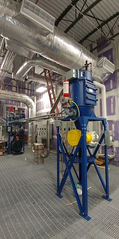 SysTech Vacuum System with collector, multi-stage exhauster, BIBO Filter housing and custom control panel.