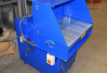 Portable Downdraft Work Station on casters - Table has adjustable side shields for improved dust collection on smaller pieces and when opened up, larger pieces can be handled.
