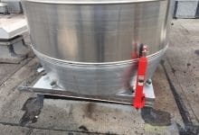 American Coolair Centrifugal Roof Exhauster for industrial food frying application, equipped w/ hinge kit & integral grease drip pan.