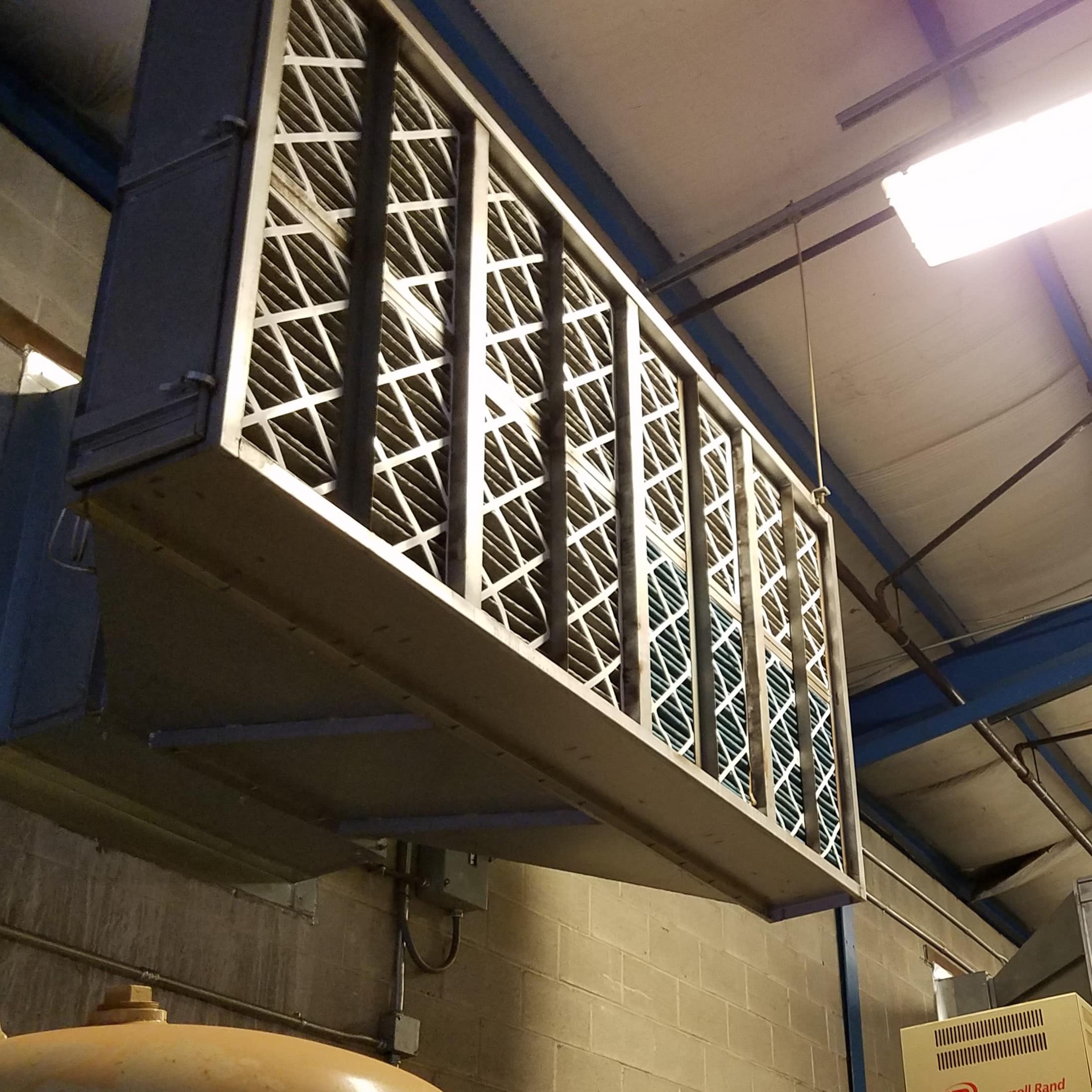 Intake air filter for a compressor room.