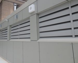 Acoustic louvers allow air movement through a building area or enclosed space. Internally generated noise transmitted to outside low-noise designated areas is attenuated, along with rain entrainment kept to a minimum.