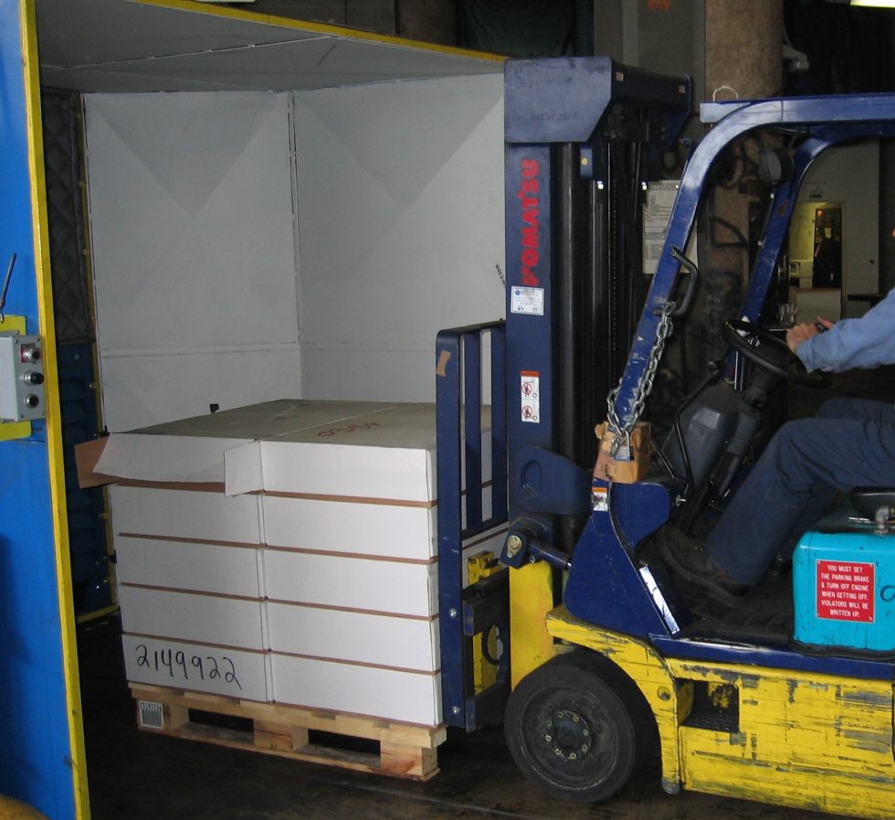 Dust Control Booth Keeping Forklifts Clean SysTech Design Inc.