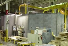 A flexible quilted blanket or “soft wall enclosure, 55’ long x 38’ wide x 10’ tall with floor mounted support structure, access doors, windows and a control panel ventilation point. Quilted panels, model QCC-1000, were supplied by Noise Suppression Technology and consisted of a quilted vinyl absorber layer mounted on a 1 pound per square foot barrier material. The result was an 18-20 dBA reduction for the operators.